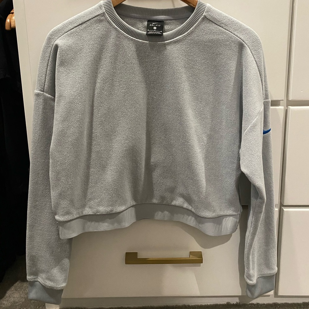 Nike medium light blue fleece crop sweatshirt side sip detail
